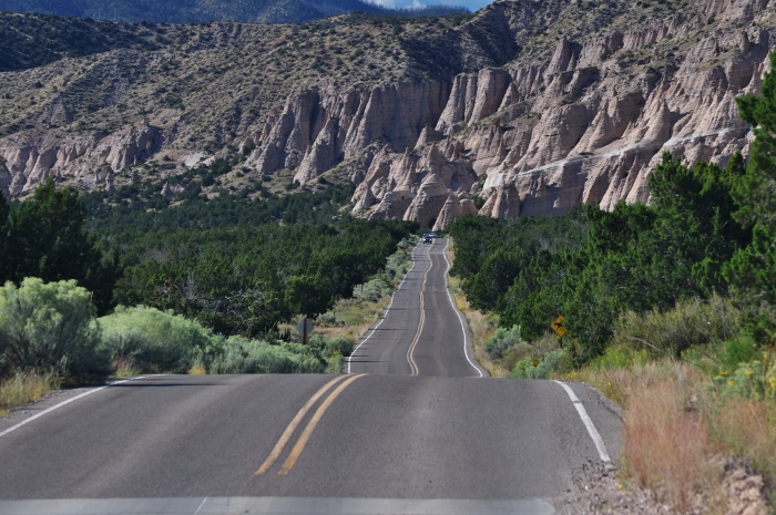 road leading to tent rock formations